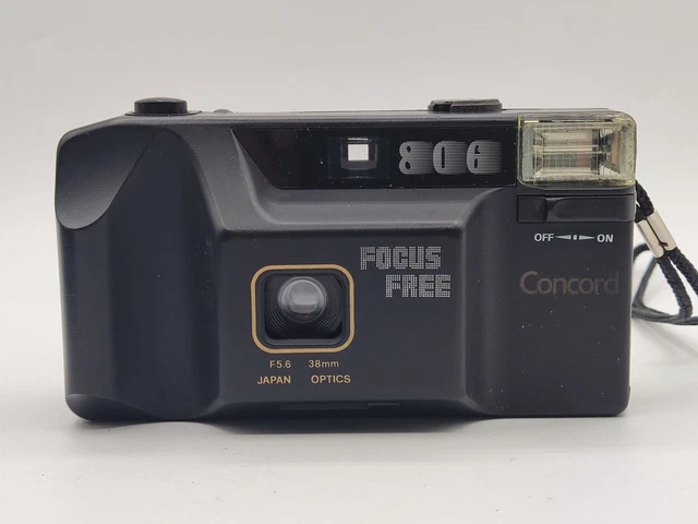 Cámara fotográfica vintage Concord 806 Focus libre de 35 mm con estuche probado y en funcionamiento