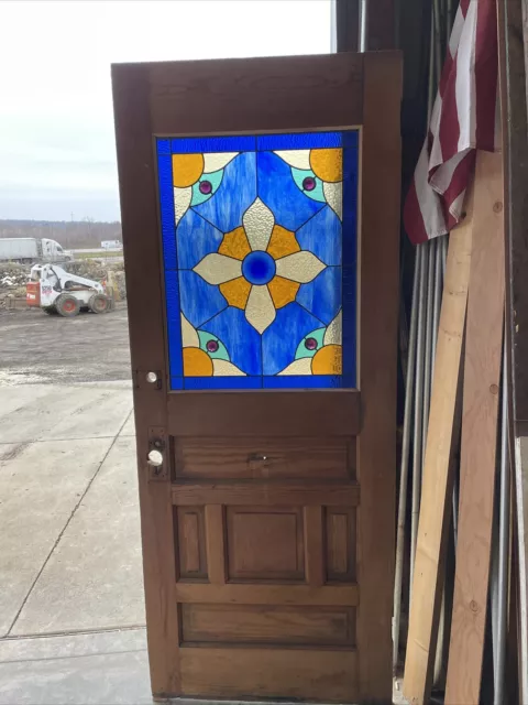 An 667 antique stained glass entrance door 32 x 79.25 x 1 3/8