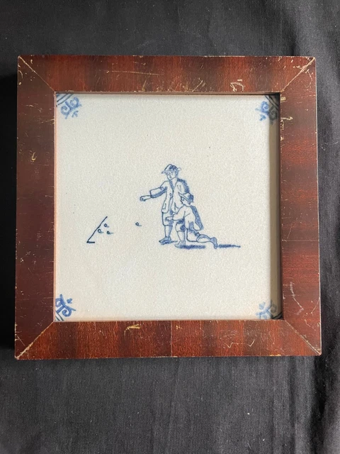 Antique Framed Dutch Delft Tile  playing a game  17th century