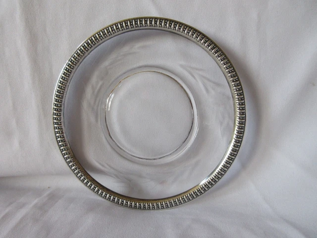 Plate Clear etched with sterling silver rim. 6"