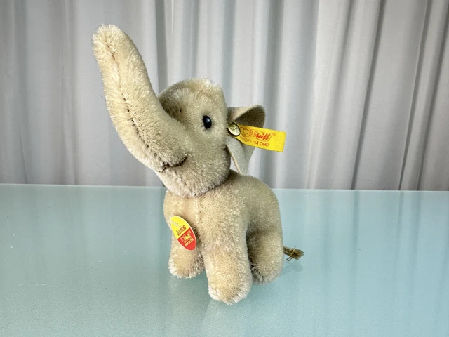 Steiff animal 400407 éléphant sur roues 43 cm. Excellent état