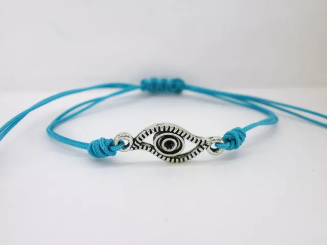 2 Pulsera  "Abril"  charm ojo turco en plata tibetana - hilo turquesa (2020) 3