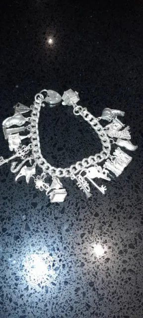 Vintage Heavy Sterling Silver Charm Bracelet With 18 Charms.