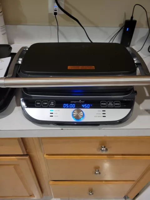 https://www.picclickimg.com/CZsAAOSwVexkzaxd/Pampered-Chef-Deluxe-Electric-Grill-Griddle-100348.webp