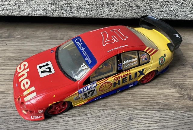 FORD: A NOS 1:43 scale Classic Carlectables Ford Falcon Shell Helix Racing, Dick Johnson #17