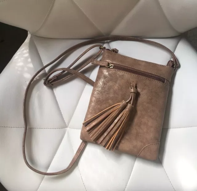 Brown small crossbody bag with front tassel detail