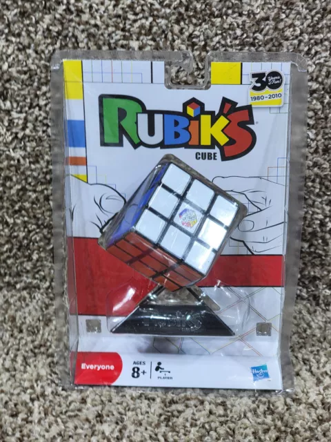 Cubo de Rubik 3x3 Juego de Rompecabezas con Soporte Rubik Hasbro Juguete Original A9312 NUEVO