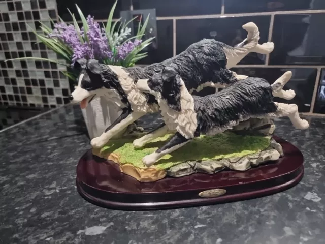 Collectors ,The Juliana Collection Playful running Border Collies figurine .