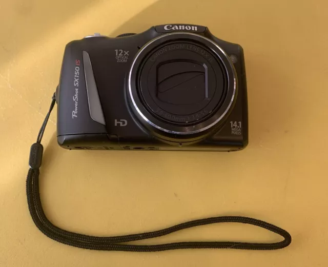 Cámara digital Canon PowerShot SX150 IS 14,1 MP y tarjeta SD de 8 GB PROBADA EXCELENTE