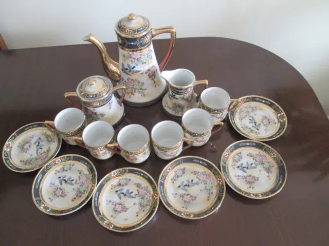Chinese coffee set - beautifully decorated in flowers, blue birds and gold.