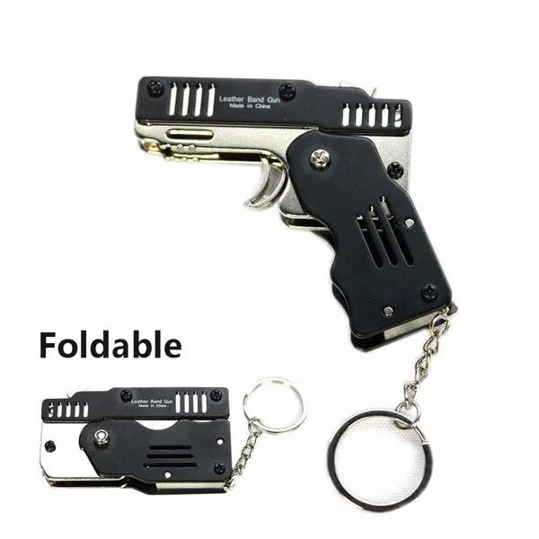 1pcs Mini porte-clés Bande en caoutchouc Pistolet Jouet Pistolet