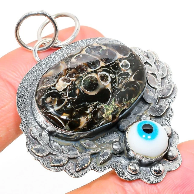 Fossil evil clearance eye necklace