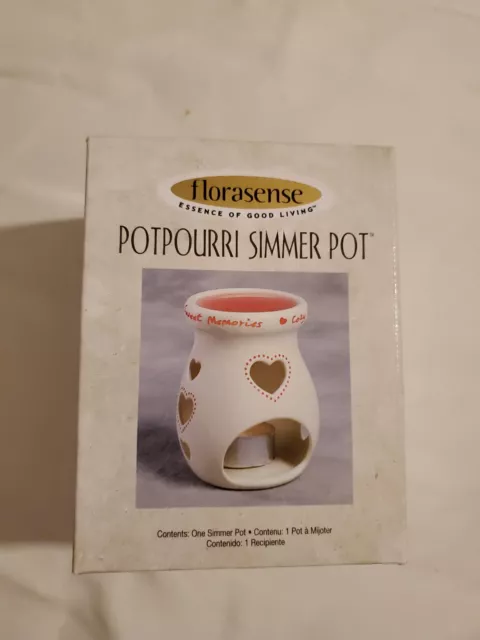 https://www.picclickimg.com/CjwAAOSwcGhjhELC/Vintage-New-In-Box-Florasense-Potpourri-Candle-Simmer.webp