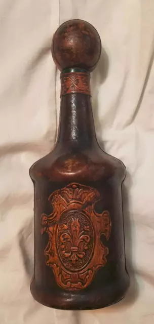 Leather covered glass bottle liquor decanter from Italy tooled vintage rare