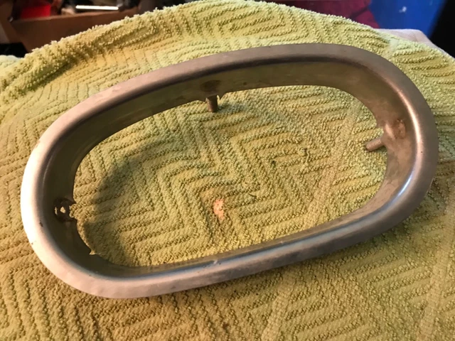 ? BUMPER EXHAUST BEZEL Light Retainer Trim Molding Surround ??? 1958 Cadillac