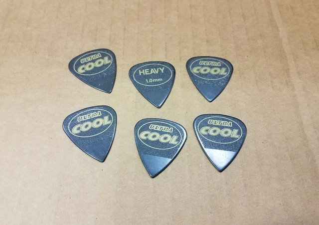 WINGO Guitar Capo and Non Slip Textured Guitar Picks 5 Pack WINGO Guitar Capo and Non Slip Textured Guitar Picks 5 Pack