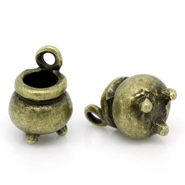 Hallazgos antiguos de joyería de bronce con dije de pellizco