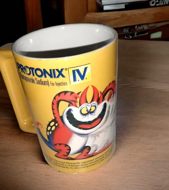 PROTONIX IV YELLOW Mug Cup Heartburn Monster Pharmaceutical Advertisement  £14.22 - PicClick UK