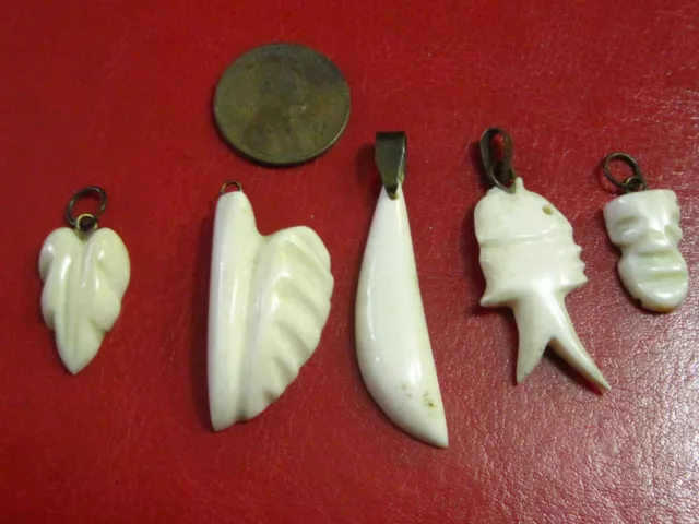 5 bone charm pendants hand carved bovine bone, fish, mask, leaf