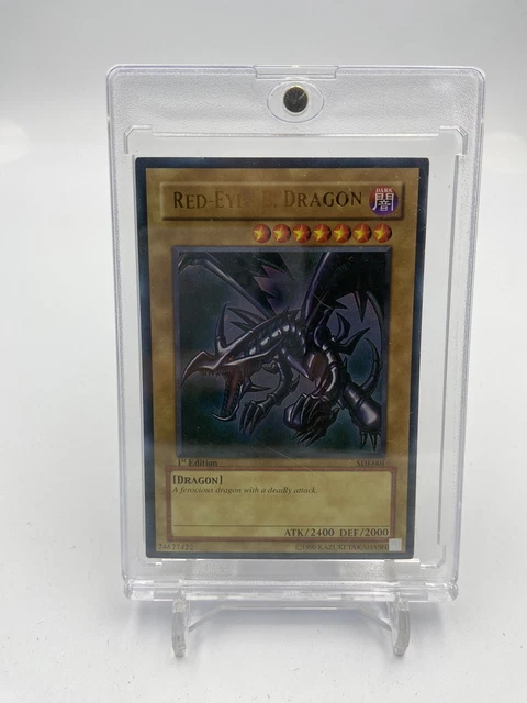 Yugioh – Drago Nero Dagli Occhi Rossi (Red-Eyes Black Dragon) – Secret Rare – 1a Edizione TEDESCO – In Toploader Ultra Pro – Set 2022 Tin