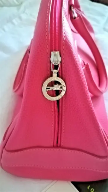 Superbe sac fushia LONGCHAMP .TTBE!