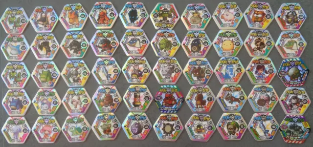 POGS - V-MSEB 50 003 Lot de 50 Pogs MAPLESTORY MAPLE STORY HEXAGONAUX Neufs