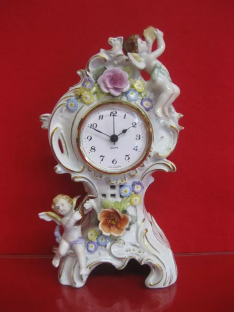 PMP Plaue Schierholz Kamin Uhr  Porzellan Figur Höhe 25 cm Engel Putto Pendule