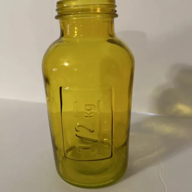 vintage glass apothecary jar  amber yellow