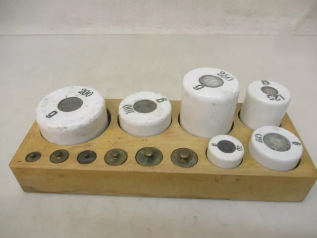 x-78024	Alter Porzellan/Messing Gewichtssatz 1-250g,mit Gebrauchsspuren