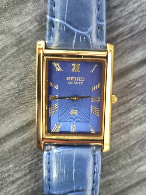 NOS Men's Gold Tank Rectangular Blue Dial Blue Leather New Mvt & Batt