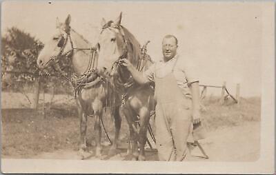 RPPC Postcard Man Farmer Overalls Holding Two Horses