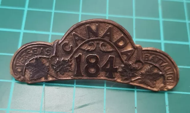 Original Shoulder Title: E.21) WW1 Canadian CEF 184th Inf Bn Kings Crown Bronze