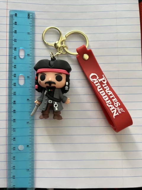 Captain Jack Sparrow Pirates Of The Caribbean Silicone & Metal Keychain New!