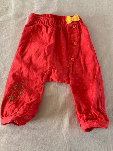 Pantalon rouge et jaune avec un nœud, taille 6 mois, marque Orchestra Bébé