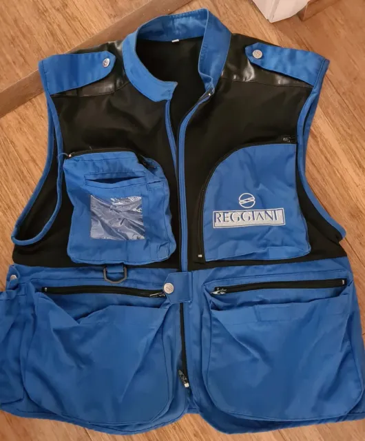 https://www.picclickimg.com/CwwAAOSw2n5lDZbg/Reggiani-XL-Multi-Pockets-Fly-Fishing-Safety-Vest.webp