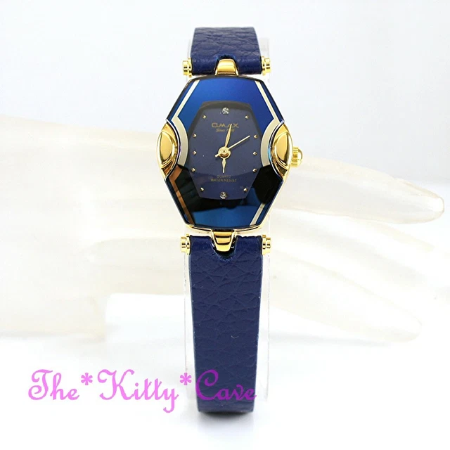 Montre OMAX Svelte CE0026 - Mouvement Seiko, Boîtier Or Acier, Cadran Bleu, Cuir