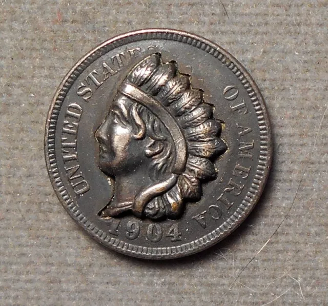 7415 Repousse Patent Bar: Indian Chief Facing Left On A 1904 Indian 1c. Mount ma
