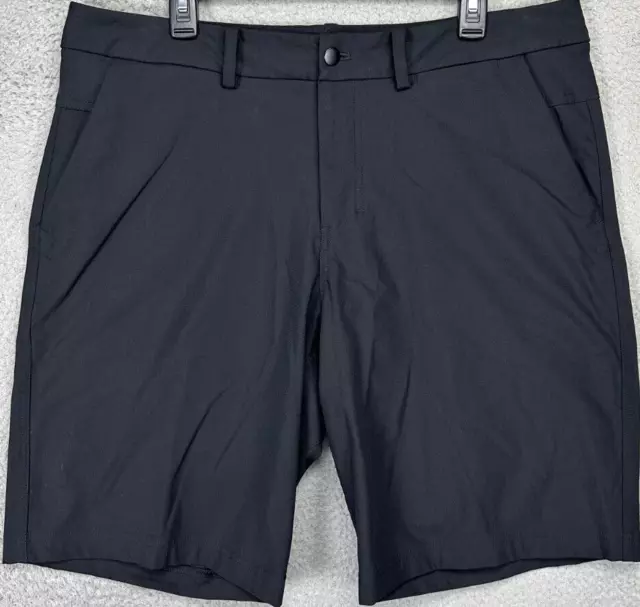 Pantalones Cortos Lululemon para Hombre 36 Comisión ABC Negro Chino Golf Frente Plano Logotipo Atlético