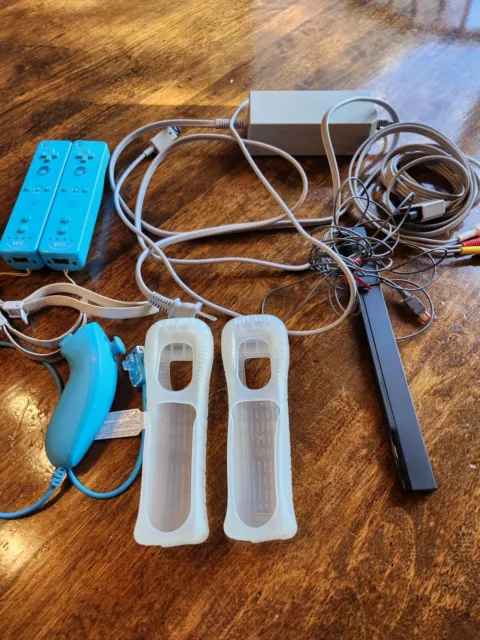 Lot of  Nintendo Wii Motion Plus Controllers  Nunchuk Adapter ,  Sensor Bar