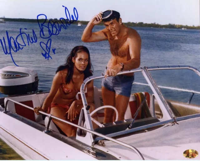 Martine Beswick - Thunderball speedboat  scene signed 10x8  photo  With UACC COA