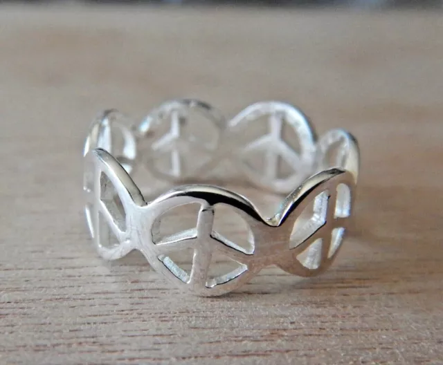 size 6 Sterling Silver 7mm wide Peace Signs all Around Ring