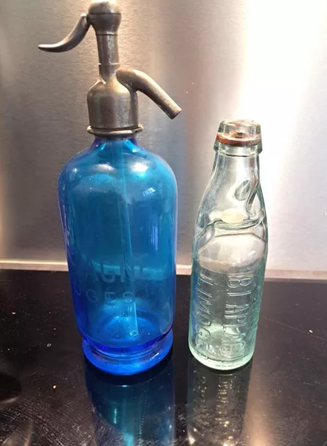 Siphon ancien. Siphon rond, bleu. Bouteille soda. Bouteille de balle. Limoges