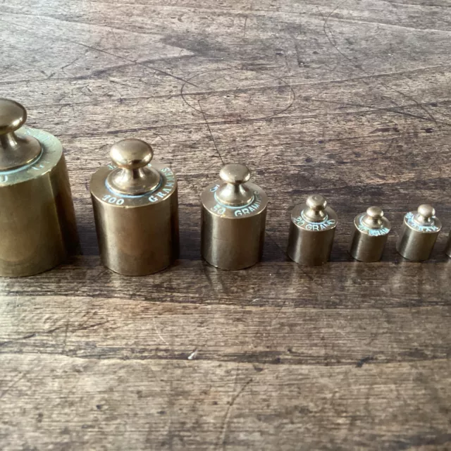 Small Vintage Set of 8 Brass Weights  Chemist Apothecary .