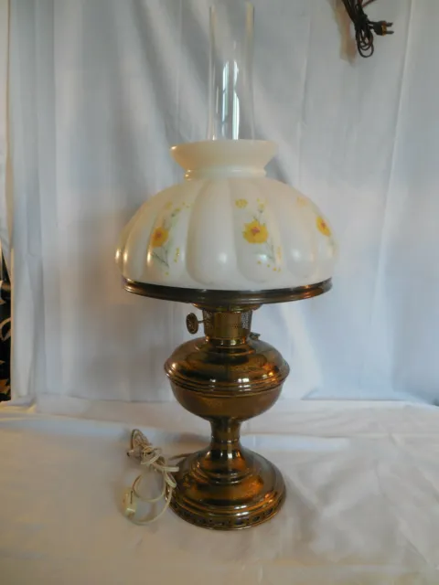 Aladdin brass electrified oil lamp w/hand painted flower design milk glass shade