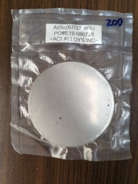 Aluminum sputter target, Al/Sc 67/33 wt%, 3" x 1/8" , bonded to Cu backplate