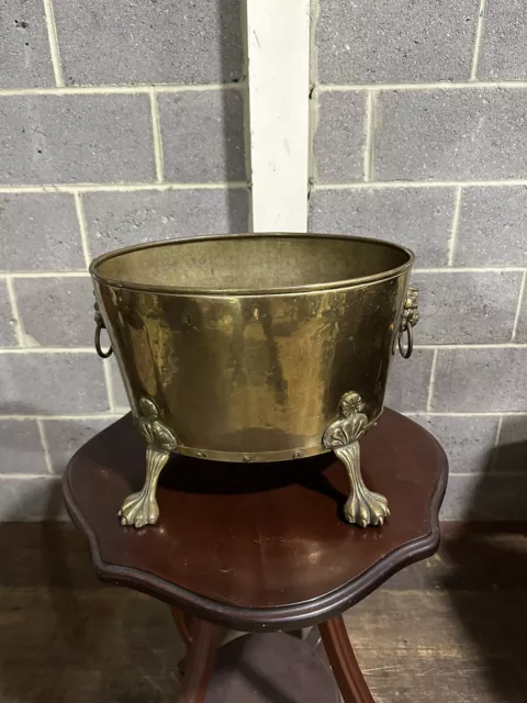 English Brass 19th Century Oval-Form Planter With Lion Ring Handles and Paw Feet