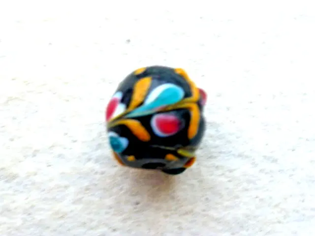 Antique Black  Glass Trade Bead W/  Yellow, White,  Blue, Pink Feathers/Flowers