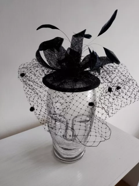 Ladies black fascinator with veil