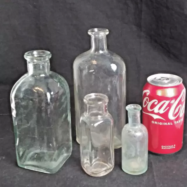 Lot of 4 Vintage Clear Glass Collectible Bottles Various Sizes