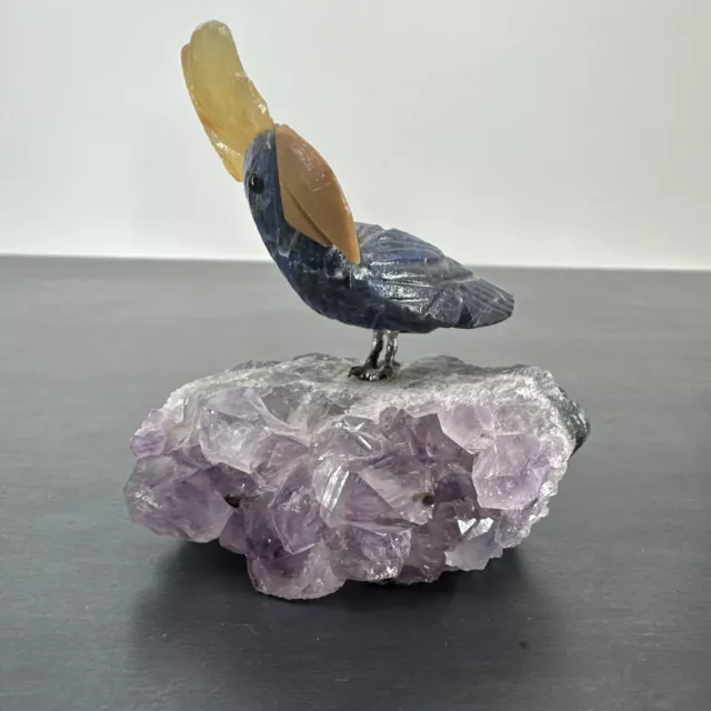 Parrot On A Beautiful Purple Clear Stone